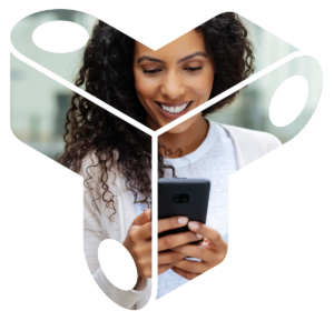 Woman, smiling, holding her phone, with the image masked by the Trust Over IP logo shape
